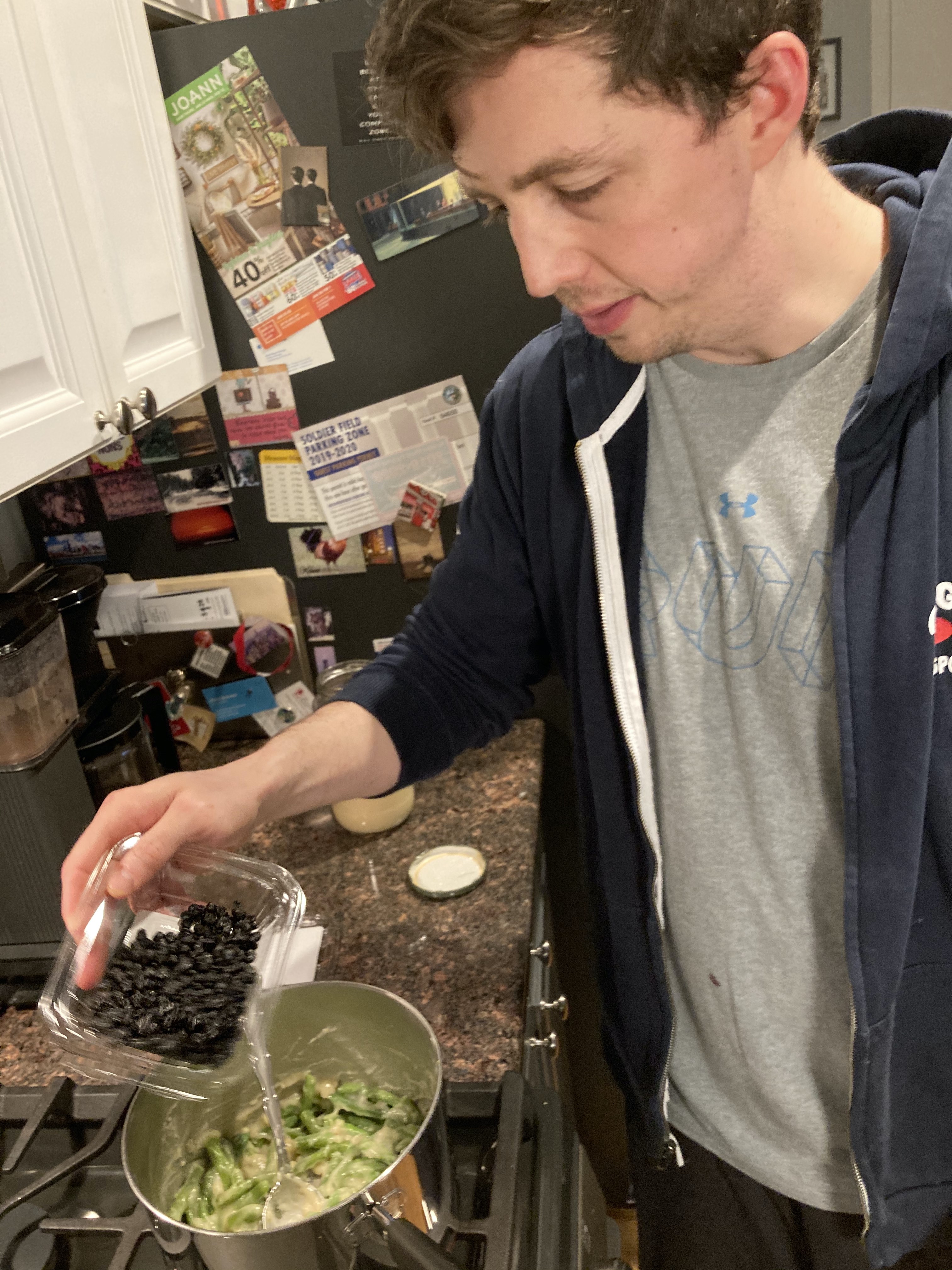Dried blueberries poured onto beans